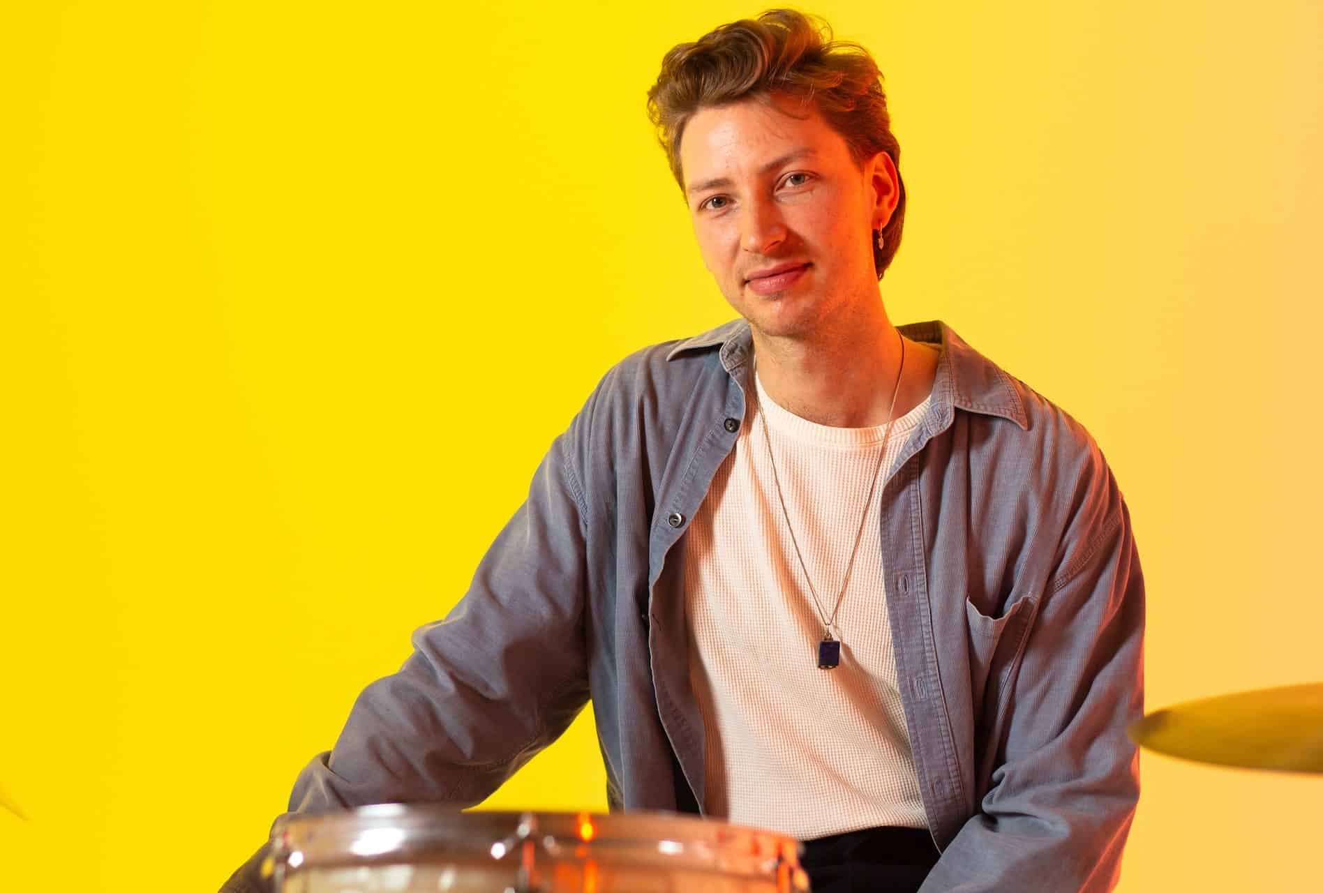 Finsbury Park drum teacher Lauric Mackintosh sat at the drum kit