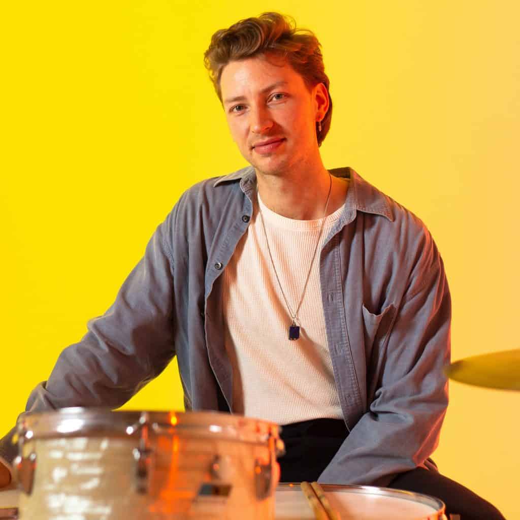 Finsbury Park drum teacher Lauric Mackintosh sat at the drum kit
