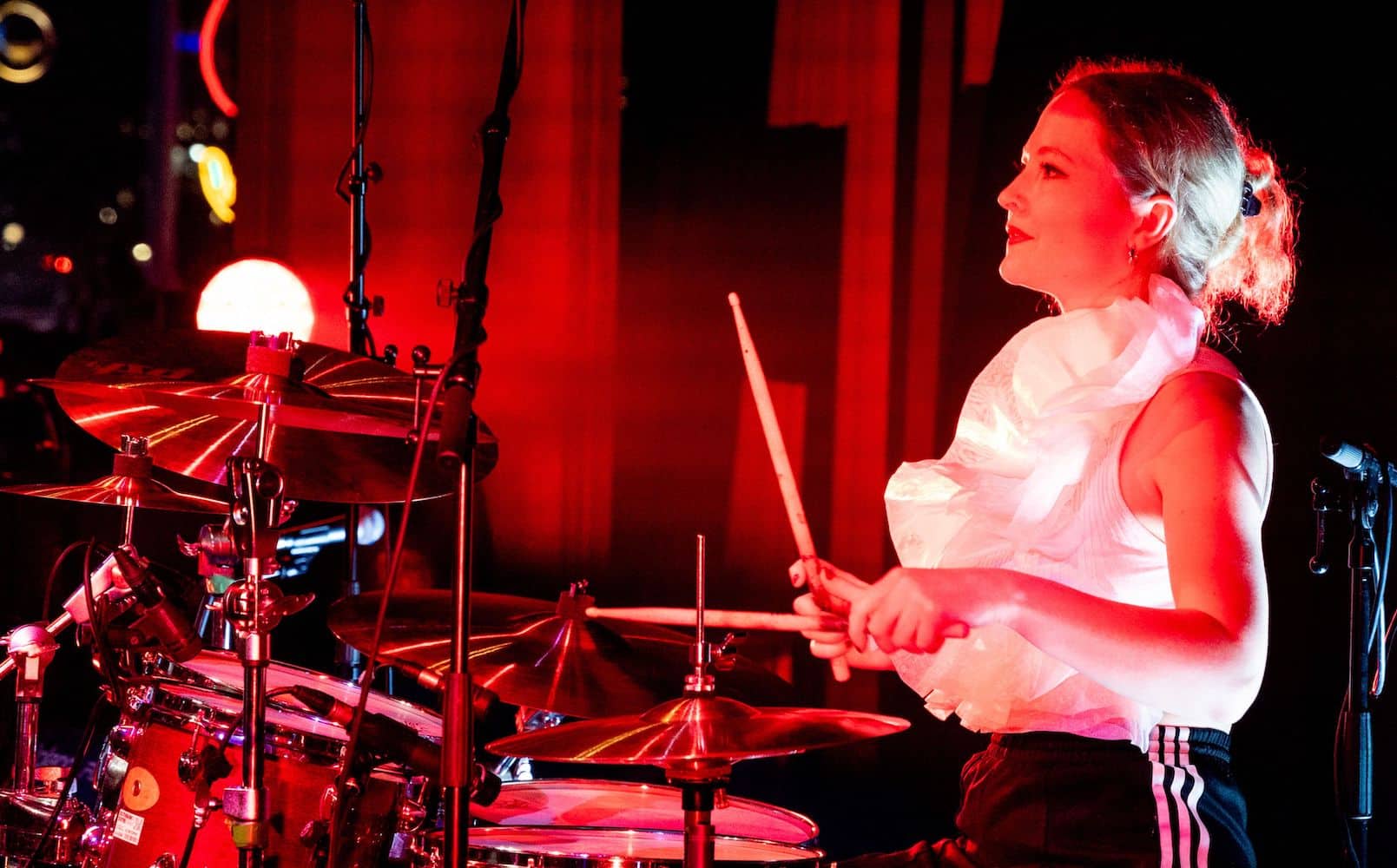 New Cross drum teacher Martha Daniels sat at her drum kit
