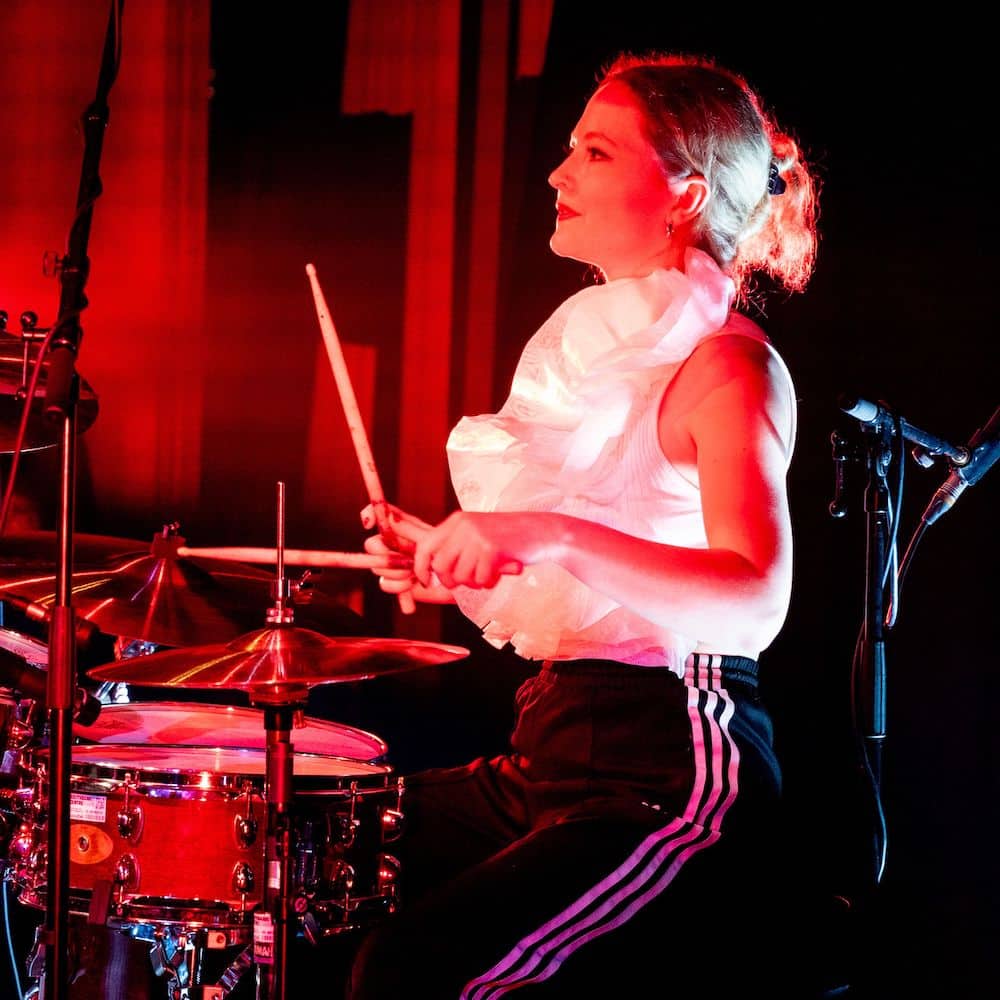New Cross drum teacher Martha Daniels sat at her drum kit